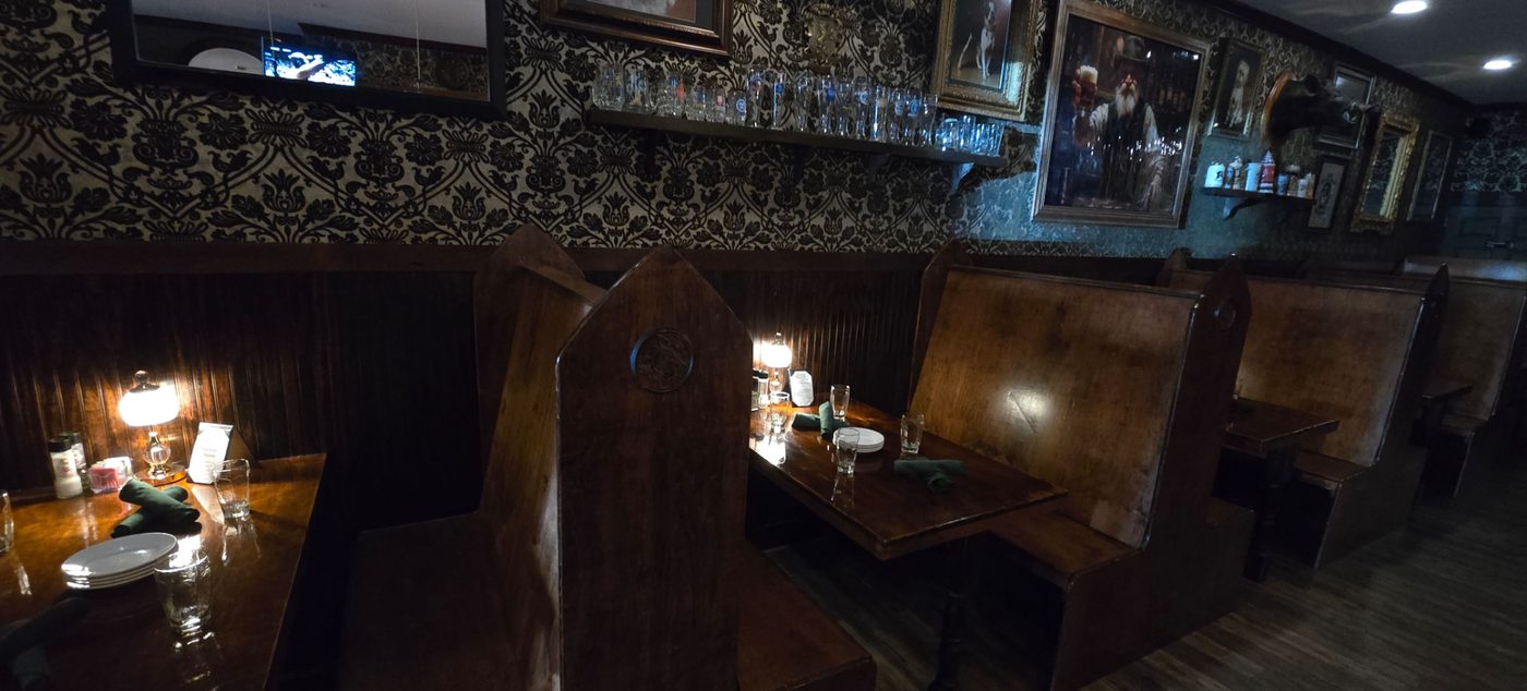 Interior booth seating at Poor Parson's Pub